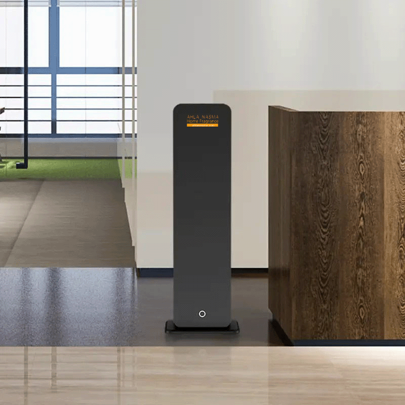 Modern floor-standing air purifier in a room with a wooden desk and large window.